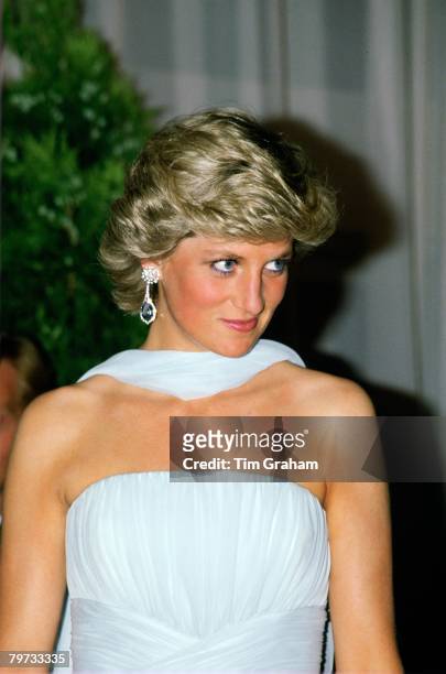 Diana, Princess of Wales at the Cannes Film Festival for a gala night in honour of actor Sir Alec Guinness, The Princess is wearing a pale blue silk...