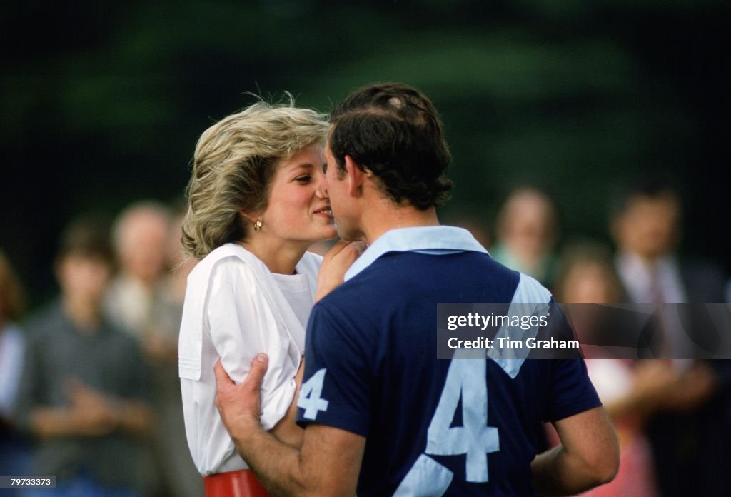 Prince Charles, Prince of Wales kisses Diana, Princess of Wa