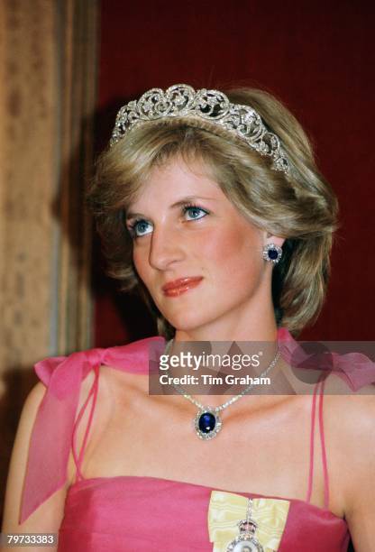 Diana, Princess of Wales wears the Spencer family tiara with a suite of sapphire and diamond jewels which had been a gift from the Crown Prince of...