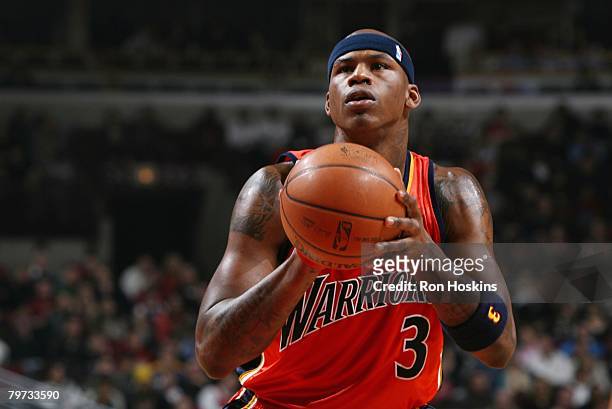 Al Harrington of the Golden State Warriors prepares to make a shot during the NBA game against the Chicago Bulls at United Center on January 18, 2007...