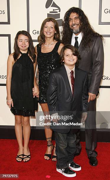 Sandra Araya and musician Tom Araya of Slayer with their children arrive on the red carpet for The 50th Annual Grammy Awards held at the Staples...