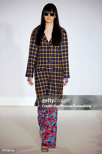 Model walks the runway wearing the Duro Olowu Fall/Winter 2008/2009 collection during London Fashion Week on the 12th of February 2008 in London,...