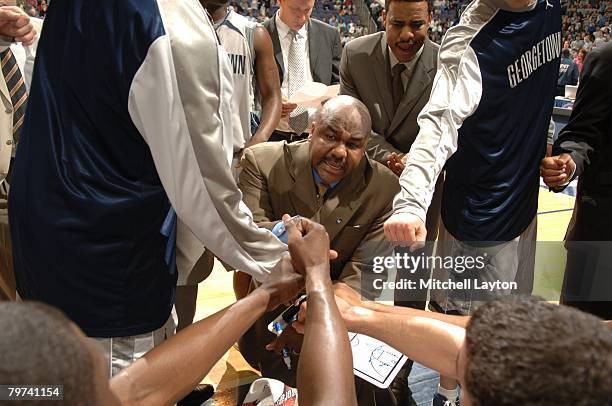 John Thompson III, head coach of the Georgetown Hoyas, talks to team during a timeout of a basketball game against the South Florida Bulls at Verizon...