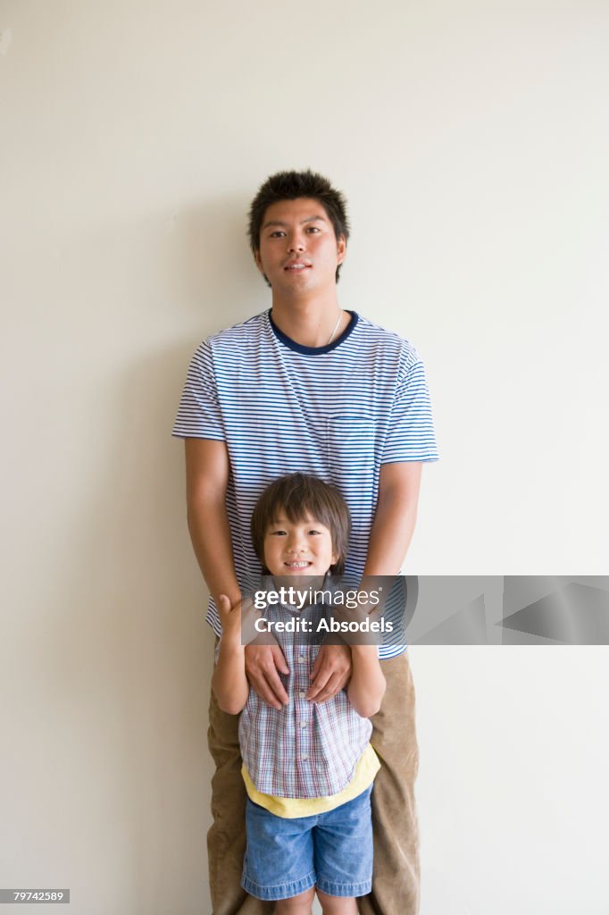 Portrait of father and son (6-7)