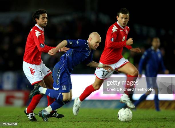 Andy Johnson of Everton is brought down by Hassan El Fakiri of Brann during the UEFA Cup round of 32, first leg match between SK Brann and Everton at...