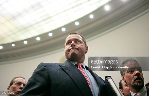 Major League Baseball pitcher Roger Clemens leaves after testifying about allegations of steroid use by professional ball palyers before the U.S....