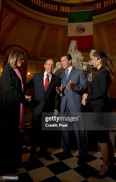 Mexican President Felipe Calderon and his wife Margarita Zavala are greeted by Governor Arnold Schwarzenegger and first Lady Maria Shriver as they...