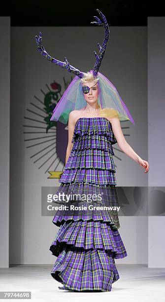 Model Agyness Deyn walks down the runway during the House of Holland LFW Autumn/Winter 2008 show at Village Underground on February 13, 2008 in...