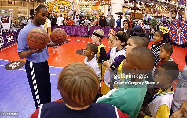 Shawn Respert Director of Basketball Operations for the D-League gives a clinic at Jam Session presented by Adidas during NBA All Star Weekend on...