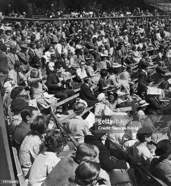 Some of the spectators at the Centre Court during the Wimbledon Lawn Tennis Championships, London, 27th June 1947.