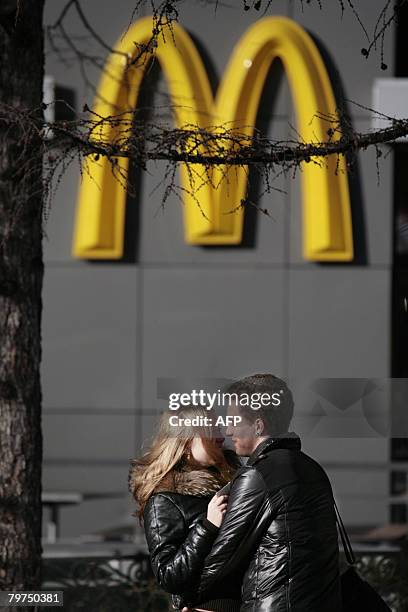 Couple kiss on Valentine's Day in central Moscow on February 14, 2008. Valentine's Day is a holiday celebrated on February 14 known around the world...