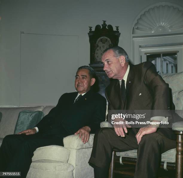 President of the United States, Lyndon B Johnson pictured right with Prime Minister of Japan Eisaku Sato as they meet for talks at the White House in...