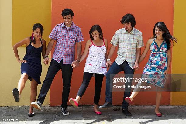 two young men dancing with three young women, puerto rico - puerto rico dance stock pictures, royalty-free photos & images