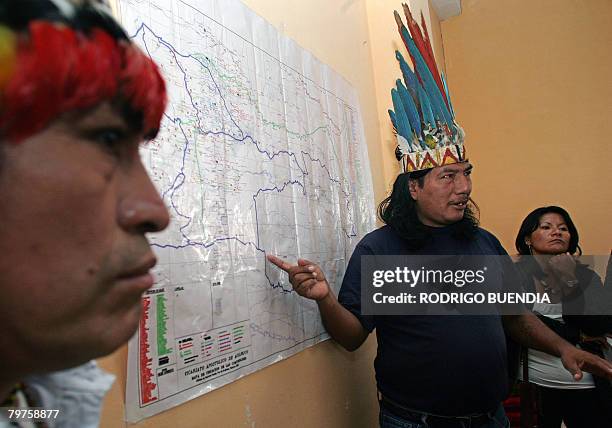 The president of the Waorani indigenous community Enqueri Nihua Ehuenguime , points out in a map the place where at least five native were murdered...