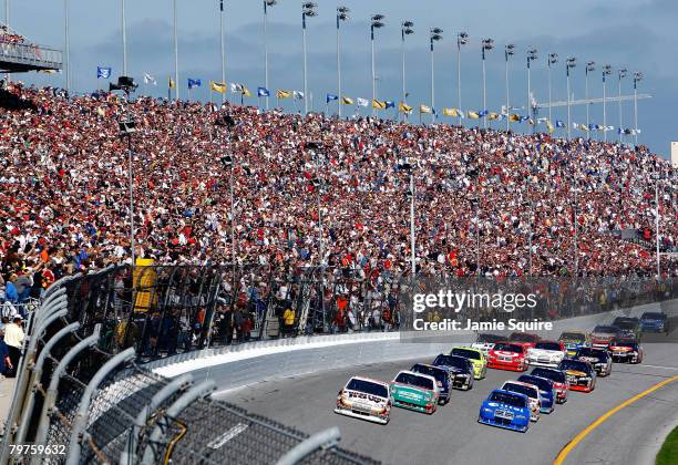 Ryan Newman, driver of the Alltel Dodge, and Joe Nemechek, driver of the Furniture Row Racing Chevrolet, lead the field during the NASCAR Sprint Cup...