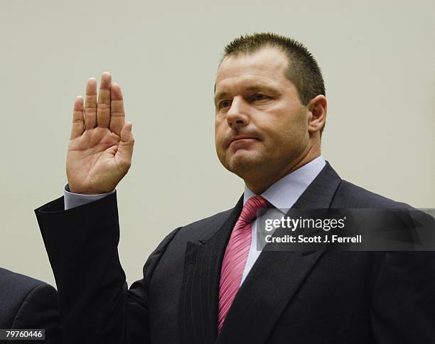 Former Major League pitcher Roger Clemens is sworn in to testify during the House Oversight and Government Reform hearing on steroid use among MLB...