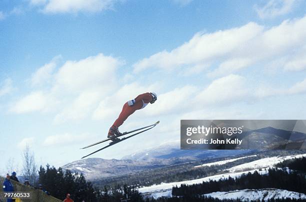 Ski jumper soars through the air during the 1980 Winter Olympics.