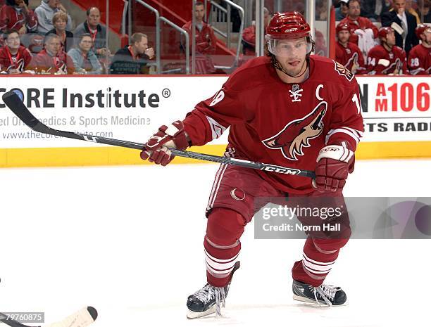 Right Wing Shane Doan of the Phoenix Coyotes skates for the puck against the Nashville Predators on February 10, 2008 at Jobing.com Arena in...