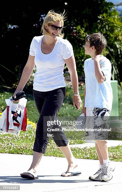 Presenter Johanna Griggs is seen with her new husband Todd Huggins and her two boys Jesse James and Joe Buster at Brookvale Mall on September 30,...