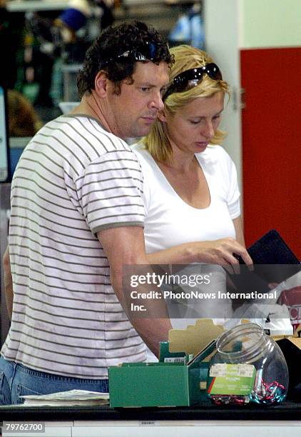 Presenter Johanna Griggs is seen with her new husband Todd Huggins at Brookvale Mall on September 30, 2006. Griggs was previously married to...