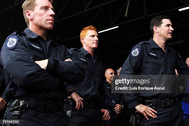 Australian Federal Police look on during the Australian Prime Minister Kevin Rudd's visit February 15, 2008 in Dili, East Timor. Rudd visited the...