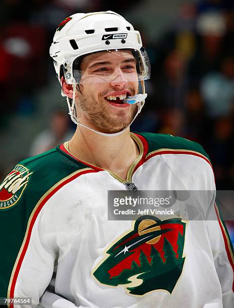 Brent Burns of the Minnesota Wild smiles after he scored during the shootout against the Vancouver Canucks at General Motors Place on February 14,...