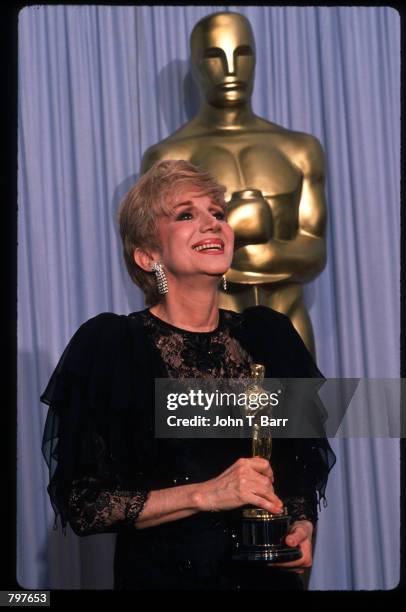 Actress Olympia Dukakis holds her Best Actress in a Supporting Role Oscar for "Moonstruck" at the Academy Awards April 11, 1988 in Los Angeles, CA....