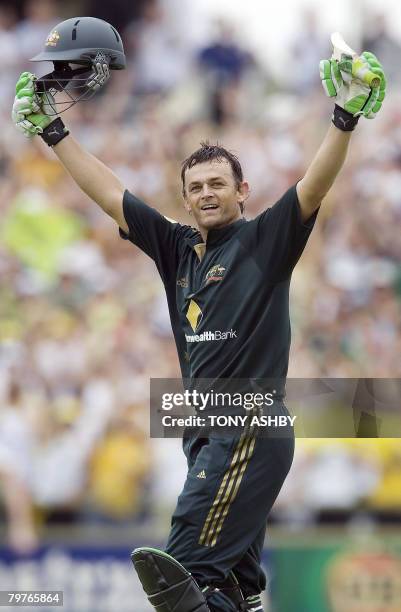 Australian opening batsman Adam Gilchrist celebrates his century during the one day international match against Sri Lanka at the WACA ground in Perth...