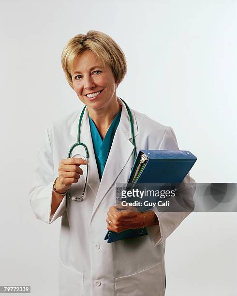 friendly doctor - cali morales stock pictures, royalty-free photos & images