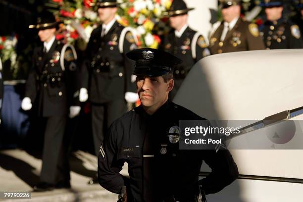 Police officers arrives at the funeral for Randal Simmons of the Los Angeles Police Department SWAT at the Crenshaw Christian Center Faith Dome...