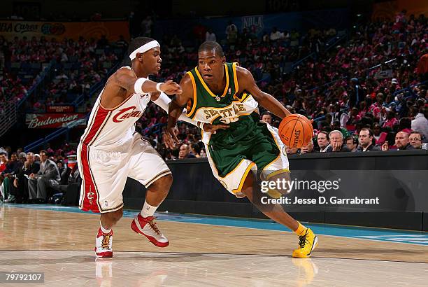 Kevin Durant of the Rookie team drives against Daniel Gibson of the Sophomore team during the T-Mobile Rookie Challenge & Youth Jam part of 2008 NBA...