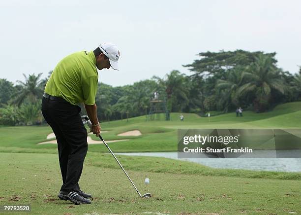 Felipe Aguilar of Chile plays his tee shot on the fourth hole during the third round of the 2008 Enjoy Jakarta Astro Indonesian Open at the...