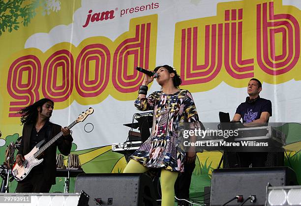 Eric Hilton , Rob Garza and guest artists of Thievery Corporation perform on stage during the Good Vibrations Festival in Centennial Park on February...