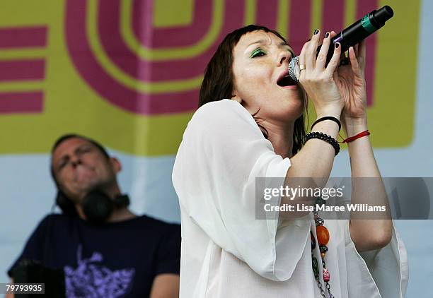 Guest artist performs with Eric Hilton and Rob Garza of Thievery Corporation during the Good Vibrations Festival in Centennial Park on February 16,...