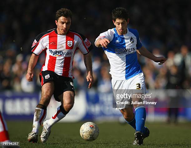 Joe Jacobson of Bristol Rovers battles with Marek Saganowski of Southampton during the FA Cup sponsored by E.on Fifth Round match between Bristol...