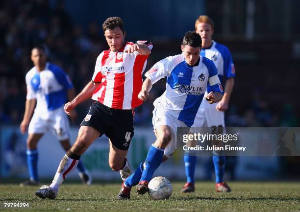 Stuart Campbell of Bristol Rovers battles with Marek Saganowski of Southampton during the FA Cup sponsored by E.on Fifth Round match between Bristol...