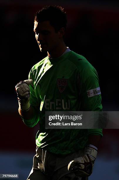 Goalkeeper Sven Ulreich of Stuttgart celebrates after team mate Mario Gomez scored the first goal during the Bundesliga match between MSV Duisburg...