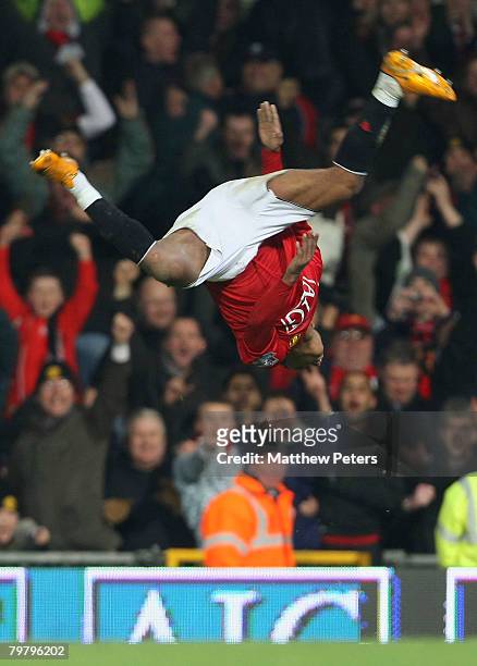 Nani of Manchester United celebrates scoring their third goal during the FA Cup sponsored by e.on Fourth Round match between Manchester United and...