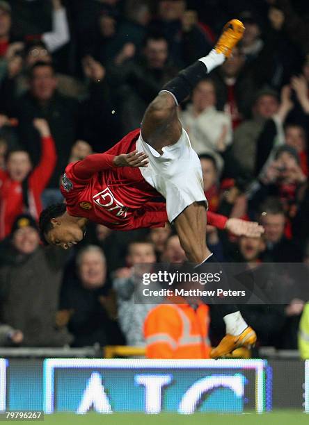 Nani of Manchester United celebrates scoring their third goal during the FA Cup sponsored by e.on Fourth Round match between Manchester United and...