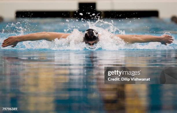 Michael Phelps competes in the Men's 200m butterfly finals during day two of the Missouri Grand Prix on February 16, 2008 at the Mizzou Aquatic...