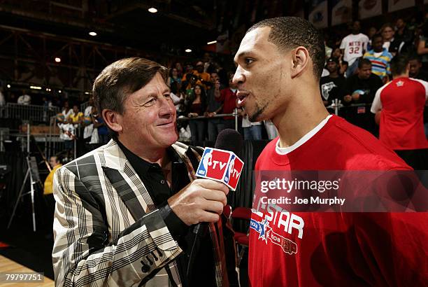 Craig Sager of NBA TV interviews Brandon Roy of the West All-Stars during the West All-Star Practice on center court during NBA Jam Session Presented...