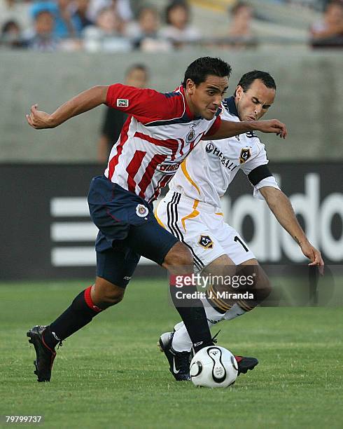 Chivas de Guadalajara's Jesus Padilla against the Los Angeles Galaxy's Landon Donovan during a SuperLiga match between the Los Angeles Galaxy and...