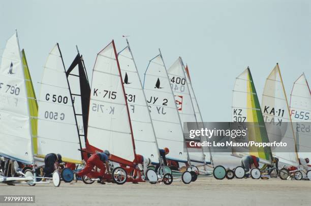 View of competitors lining up their sand yachts in position prior to competing in the land sailing World Championships on Blackpool Beach, England in...