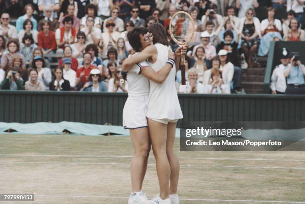 American tennis players Billie Jean King and Martina Navratilova embrace each other after beating Betty Stove and Wendy Turnbull to win the final of...