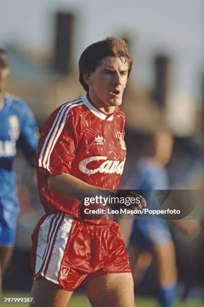 English footballer Peter Beardsley pictured in action for Liverpool FC during the League Division One match between Wimbledon and Liverpool at Plough...