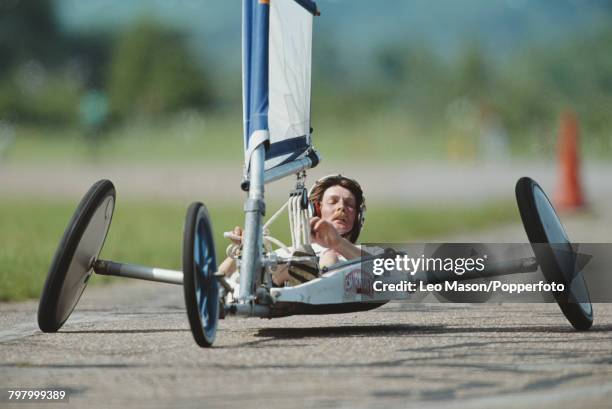 View of a competitor steering a sand yacht in a land sailing event at RAF Bassingbourn airfield in Cambridgeshire, England in 1992.