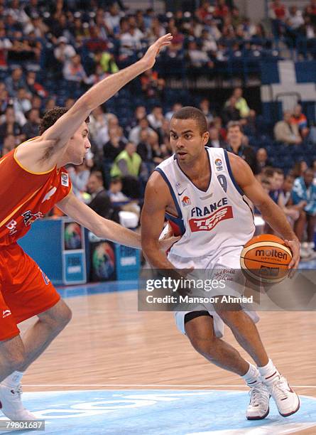 Tony Parker of France tries to escape the clutches of Spanish defender Rudy Fernandez during the Bronze medal match of the European Basketball...