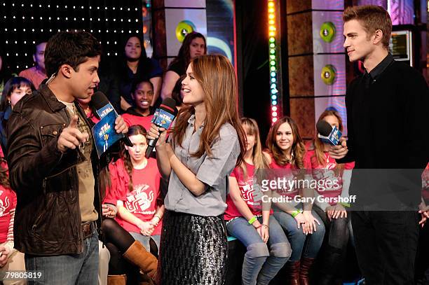 Actress Rachel Bilson and actor Ryan Reynolds visit MTV's "Mi TRL" with Carlos Santos at MTV Studios Times Square on February 12, 2008 in New York...