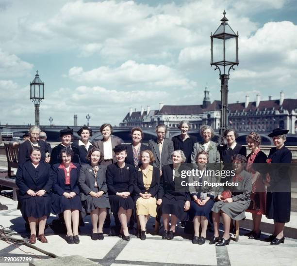 View of the new intake of women Labour Party Members of Parliament posed together on the riverside terrace at the Palace of Westminster, following...