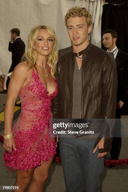 Britney Spears & Justin Timberlake pose for photographers at The 29th Annual American Music Awards at the Shrine Auditorium in Los Angeles.